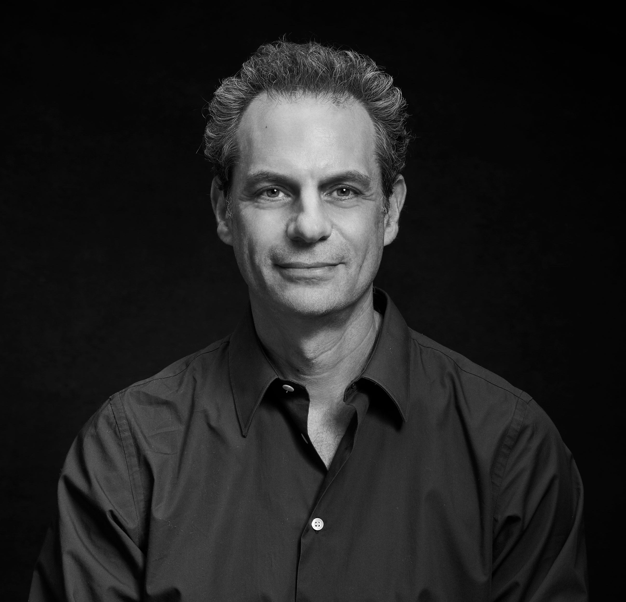 A man with short hair.