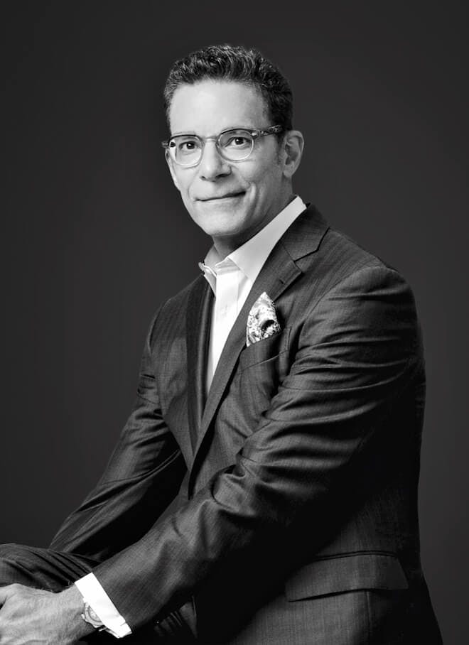Image of Dr. Ralph Garramone, Plastic Surgeon, with a caption 'Our results speak for themselves'