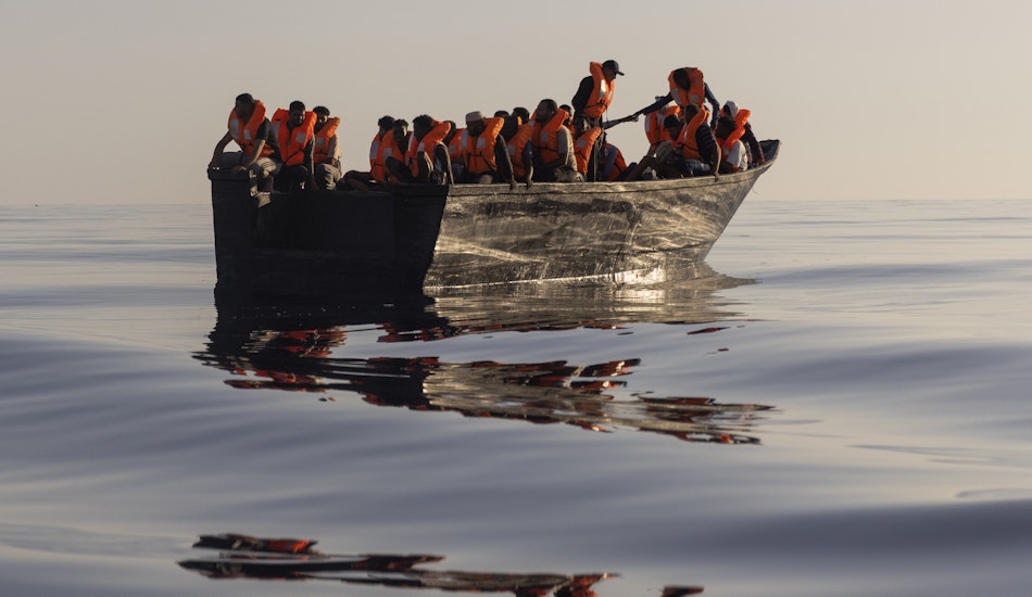 Barcă cu migranți