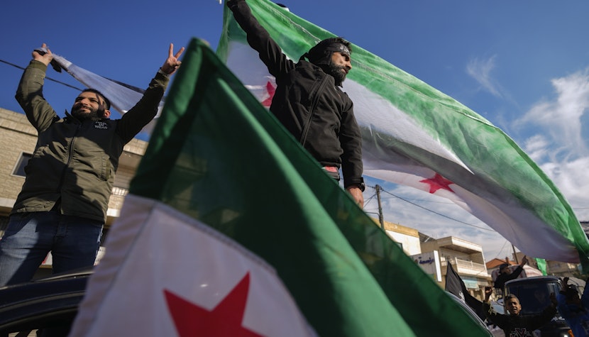 Sirieni celebrând căderea lui Bashar al-Assad Bashar al-Assad