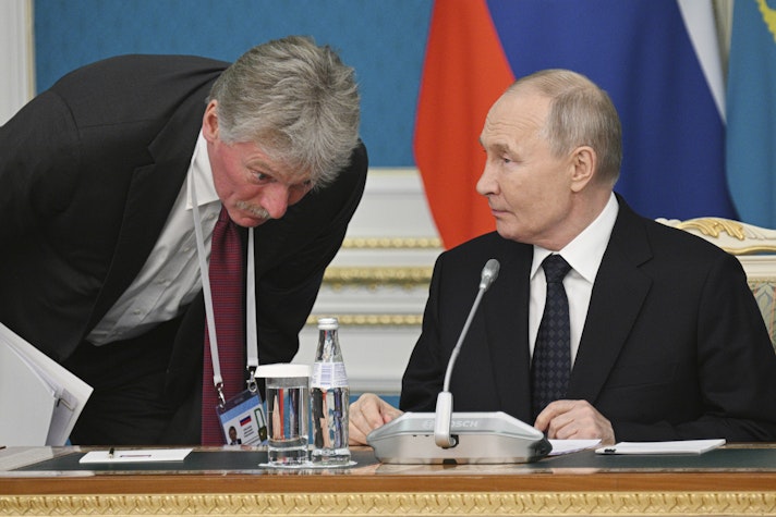 Dmitri Peskov și Vladimir Putin