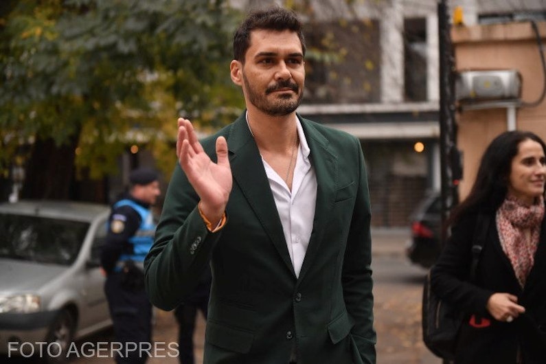 george burcea, în sacou verde