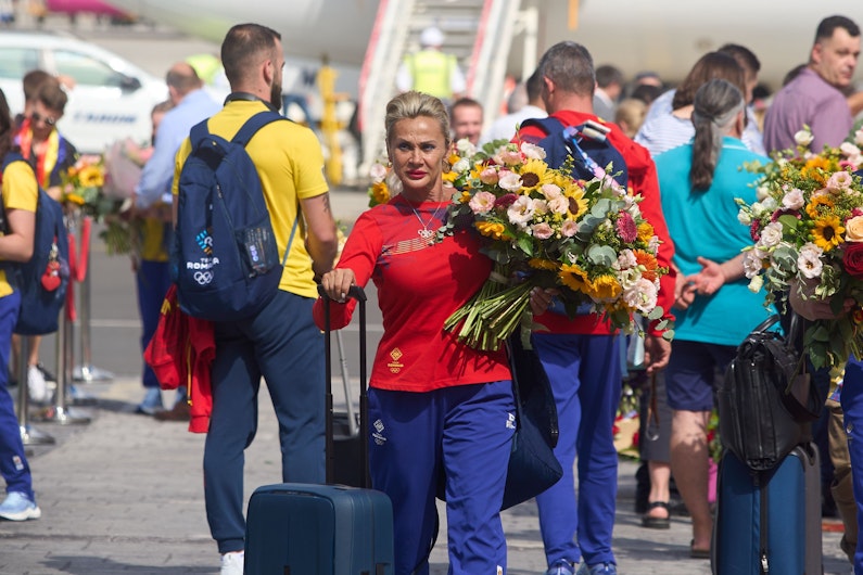 Camelia Voinea, la sosirea gimnastelor de la Jocurilor Olimpice