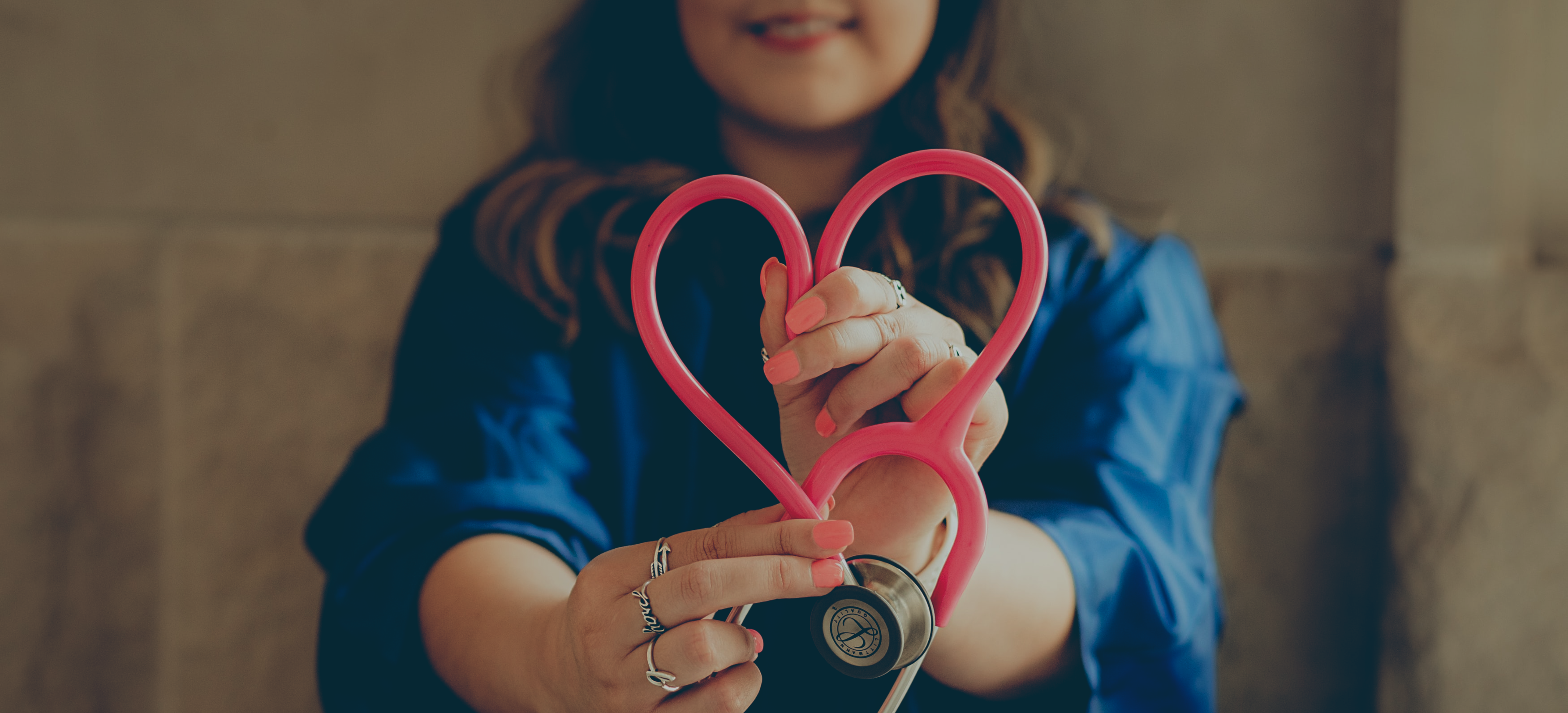 Nurse with heart shaped stethoscope