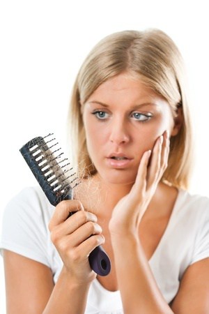 woman with comb - photo