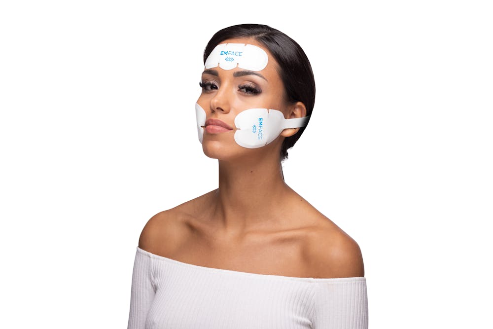 woman wearing the emface device