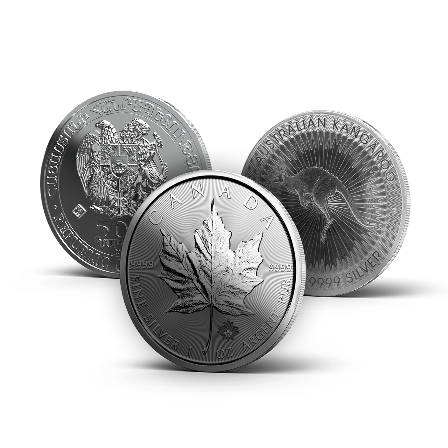 Drei im Bild verteilte Silbermünzen (Kangaroo, Maple Leaf, Arche Noah). Diese können Sie im Goldgeschäft in Görlitz erwerben.