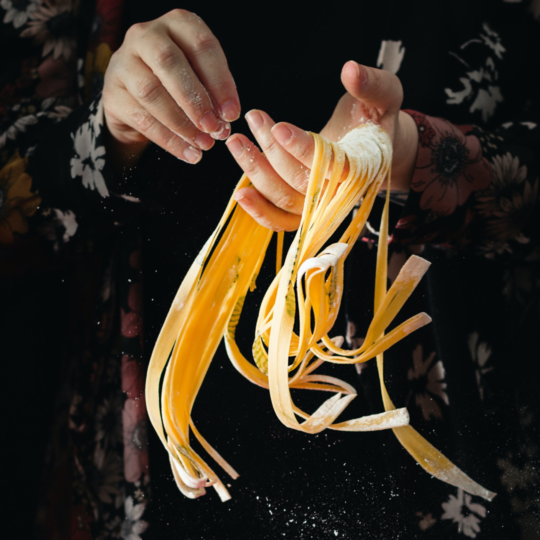 Pasta tossed in hands