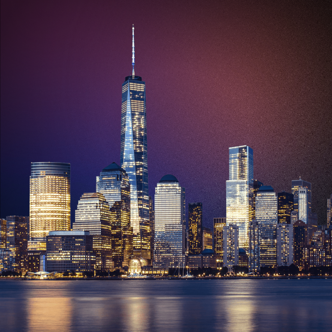 NYC skyline against purple gradient sky