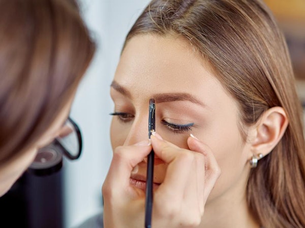 Make-up artist applying make-up