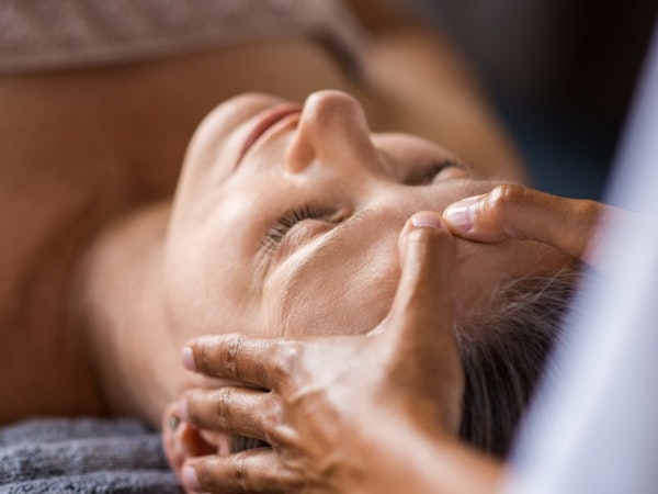 Woman having an anti-ageing facial