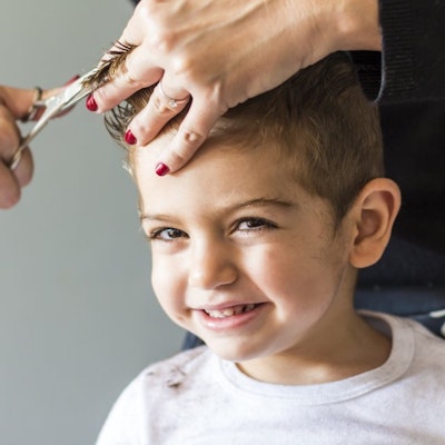 Boy getting his hair cut