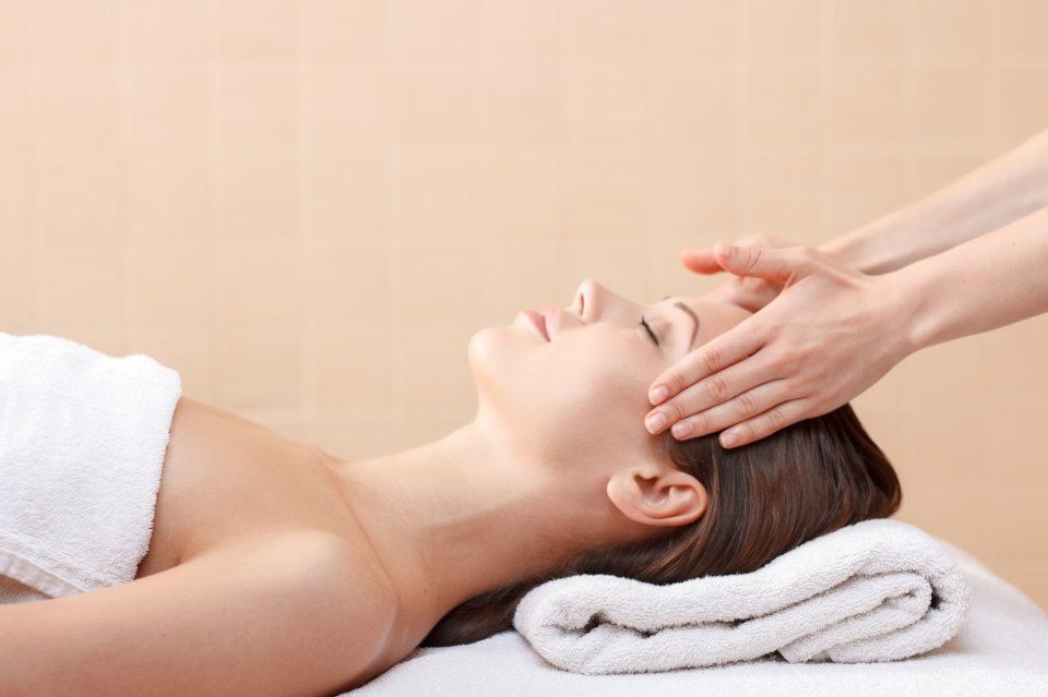 Woman receiving a relaxing massage treatment