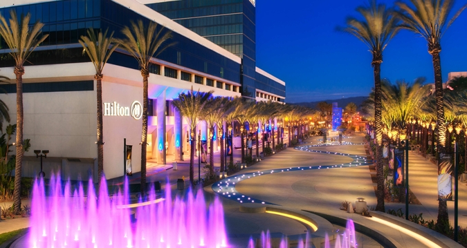 Hilton Anaheim Hotel front exterior with fountain in foreground