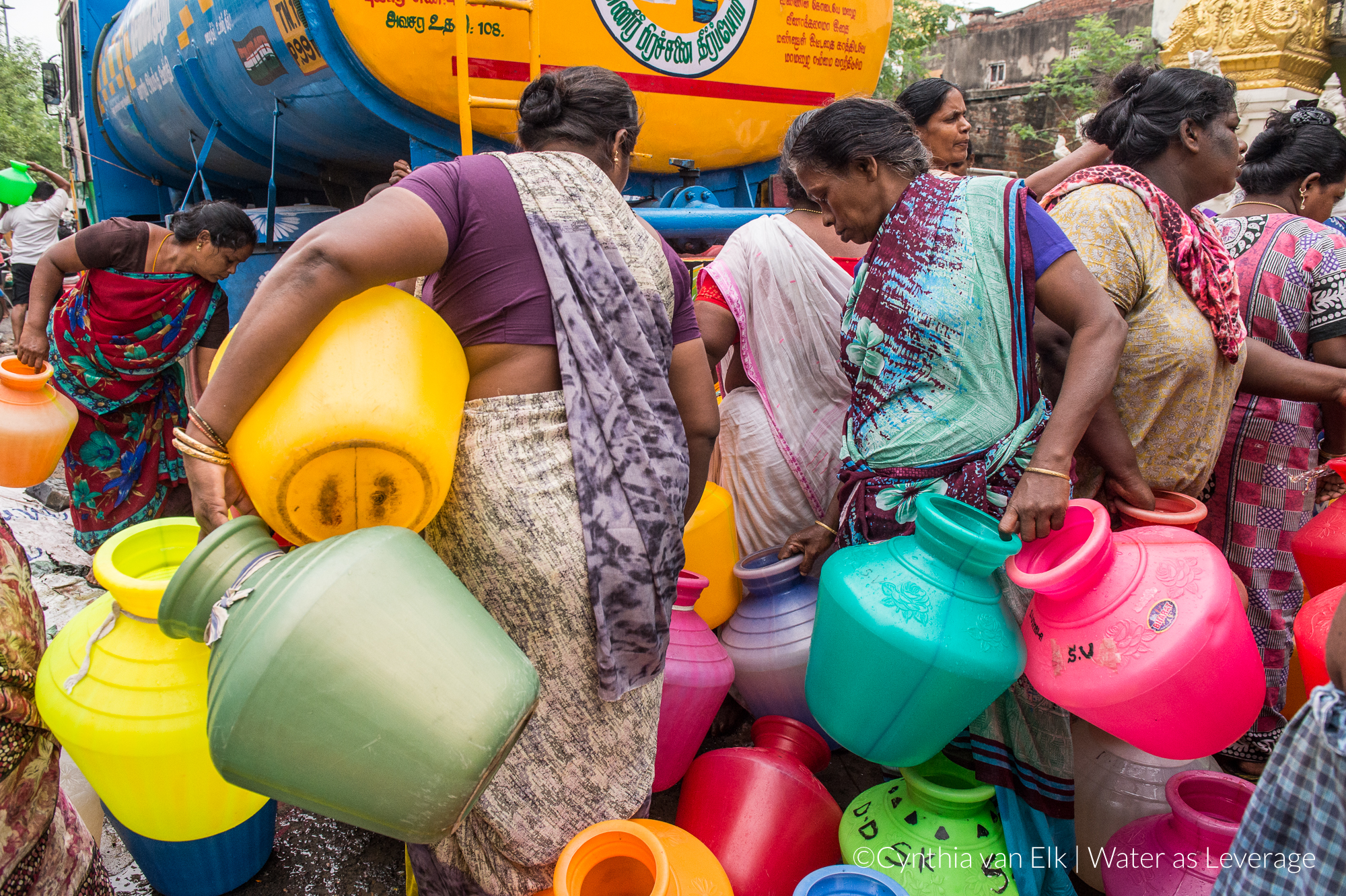 Women collecting water from a tank