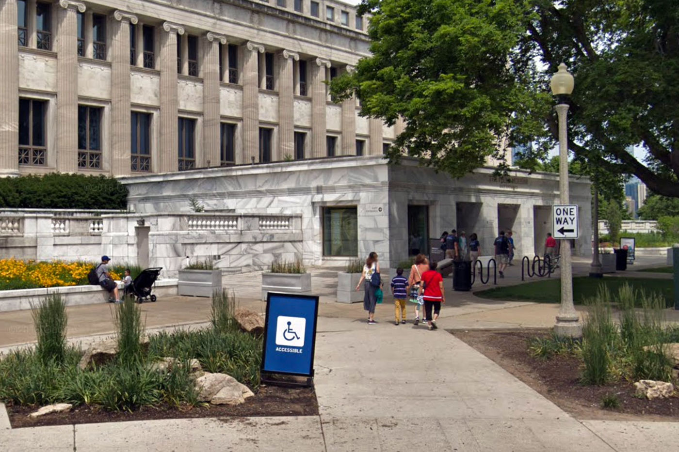 The accessible East entrance is on the side of the building that's closest to Lake Michigan and farthest from Lake Shore Drive. 