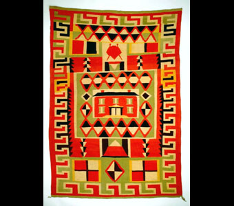 Germantown tapestry blanket with geometric elements that serve as a frame for a large two story colonial house design with a diamond border. Navajo.  74.5 x 54.25 inches
 
 
Credit Information: © 1990 The Field Museum ID# A111431cPhotographer: John Weinstein