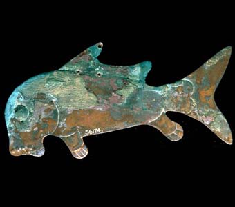 Thin flat copper fish effigy with dorsal and ventral fins. Mound 25 copper deposit. Hopewell. Identified as a small mouth buffalo fish (Ictiobis bubalus) or suckerfish.Credit Information: © 1988 The Field MuseumID# A110026c Photographer: Ron Testa