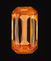 A rectangular-faceted golden Topaz of 16.62 carats, measuring 20 × 11 × 8 mm