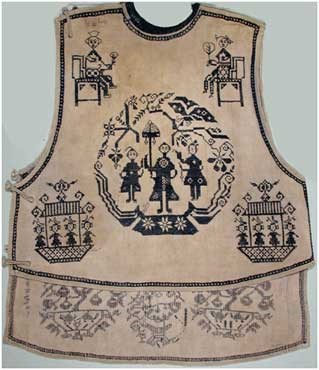 Bib decorated with theatrical figures from the play of Liang Shanbo and Zhu Yingtai.
40.5cm x 48cmSichuan ProvinceHan ChineseCotton2724.234237© The Field Museum