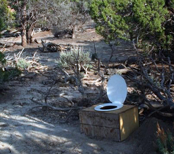 One of the more glamorous aspects of fieldwork is coming up with creative ways for large groups of isolated people to keep some semblence of sanitation and civilization. Case in point: this make-shift toilet in the middle of a Utah desert.