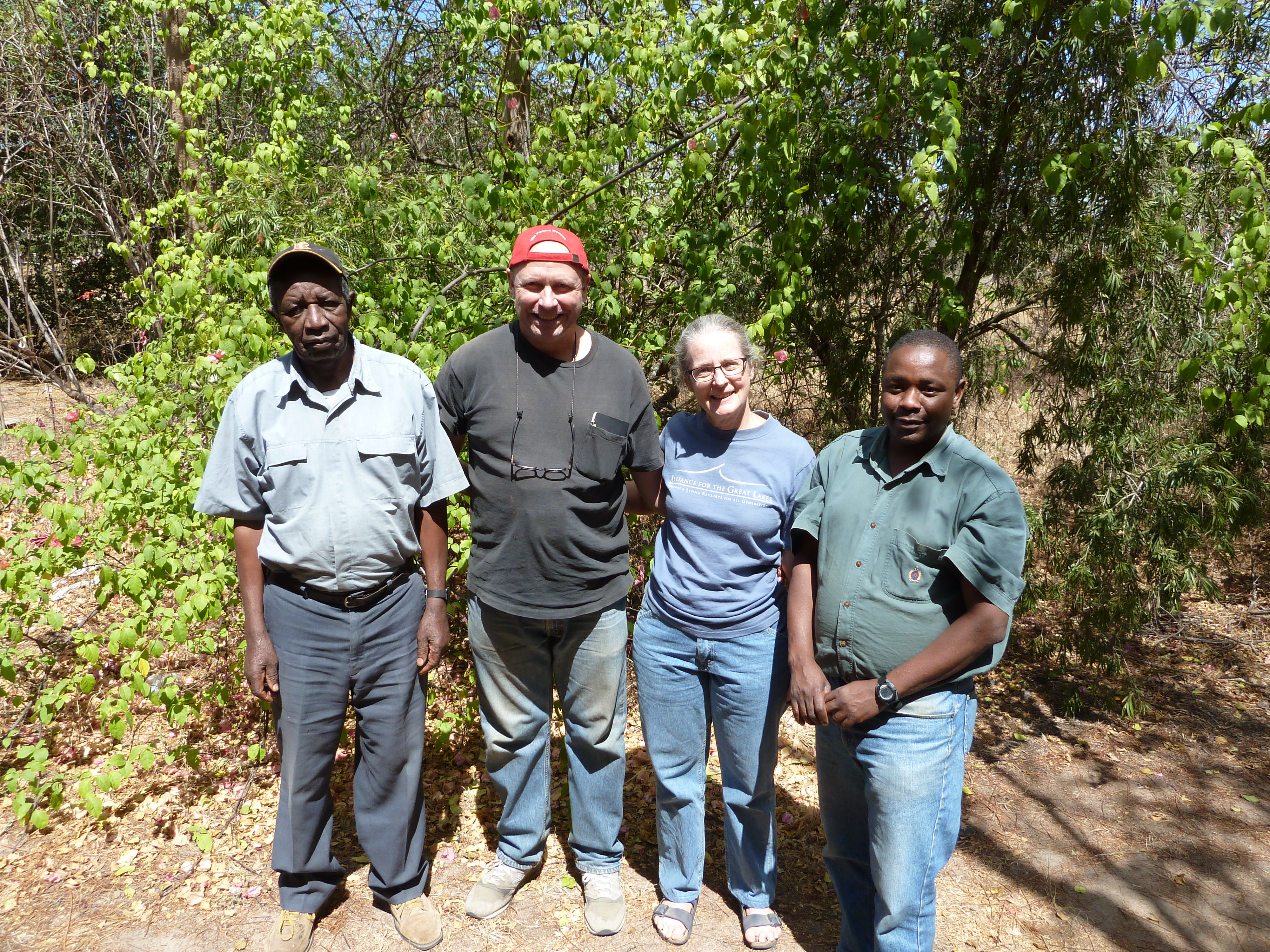 Bill, Mary Anne, and long-time Tanzanian friends and colleagues Philip Kihaule (left) , Maiko Munissi (right), in Iringa, Tanzania 2011. Courtesy of Mary Anne Rogers.