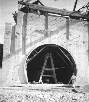 The purpose of the Panama Expedition (1911-1912), was to collect specimens of fish from the Atlantic and Pacific Oceans prior to the completion of the Panama Canal. Field Museum curator standing at 18 foot diameter giant tunnel culvert, the intake of Pedro Miguel locks. Under construction, the photo shows the collapsible steel frame used to create the round concrete chambers. Circa 1912. The Field Museum, ID# CSZ34013.
For more photos of the Panama Expedition, see our set on Flickr.