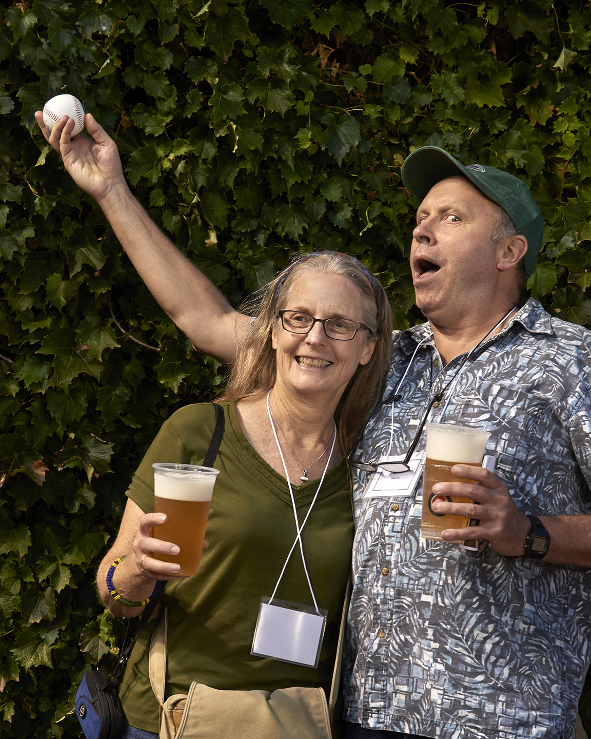 Evidencing his legendary dexterity, Bill manages to catch a fly ball while simultaneously cuddling Mary Anne and holding a beer at the “The Field at the Field!” event held at Wrigley Field in August 2014. Field Museum photo by John Weinstein. GN92026_234d