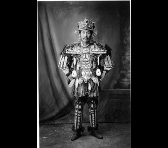 Bob Harris (Xa'Niyus) in Hamatsa dress. Louisiana Purchase Exposition, St. Louis Fair, 1904.Credit Information: © The Field Museum ID# CSA13583 Photographer: Charles Carpenter