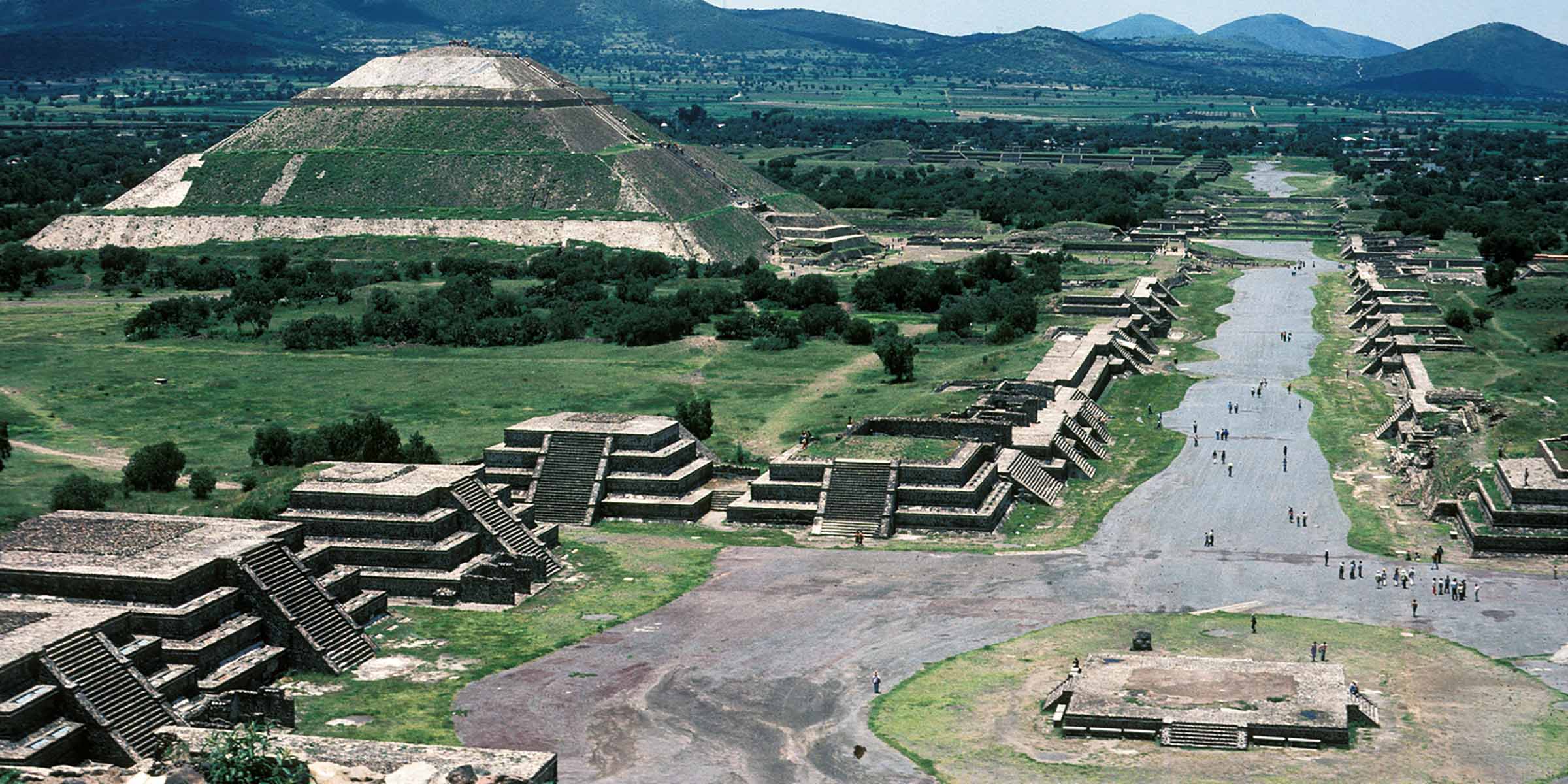 Old city ruins, including a pyramid and a central square