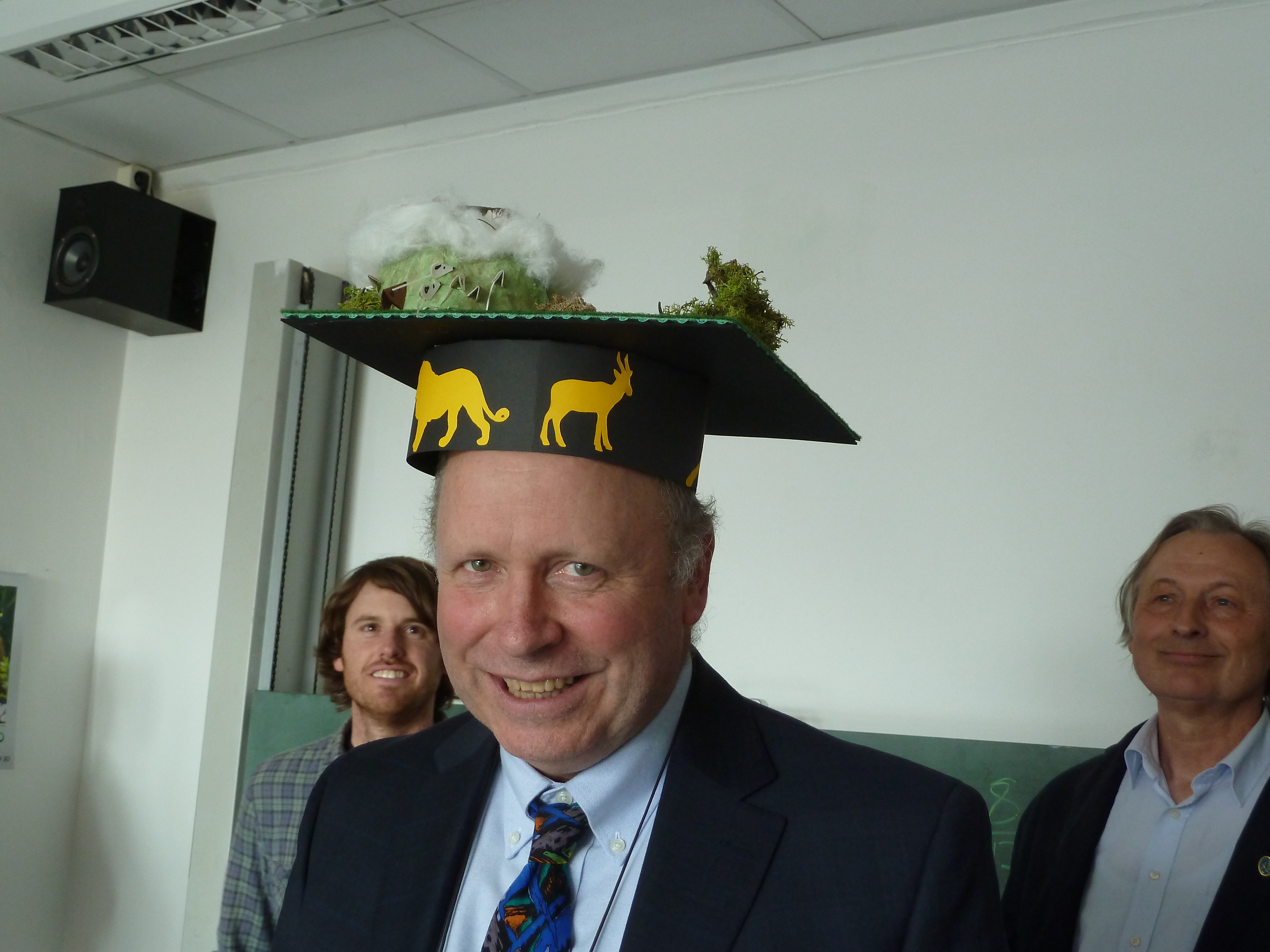 William Stanley, Ph.D., sports the unique mortarboard made for him by his colleagues to mark the awarding of his doctorate. Courtesy of Mary Anne Rogers.