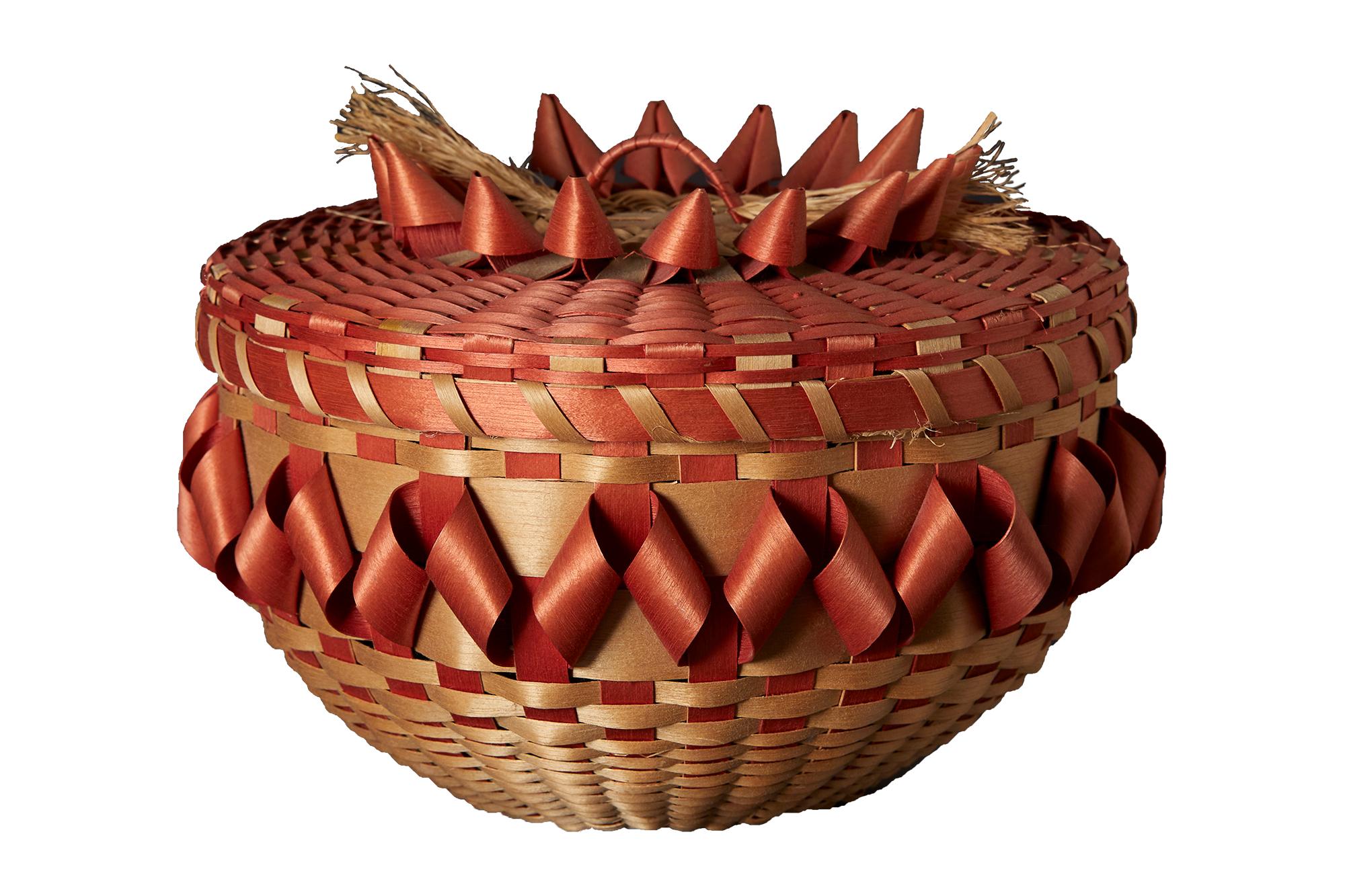 A woven tan and red basket.