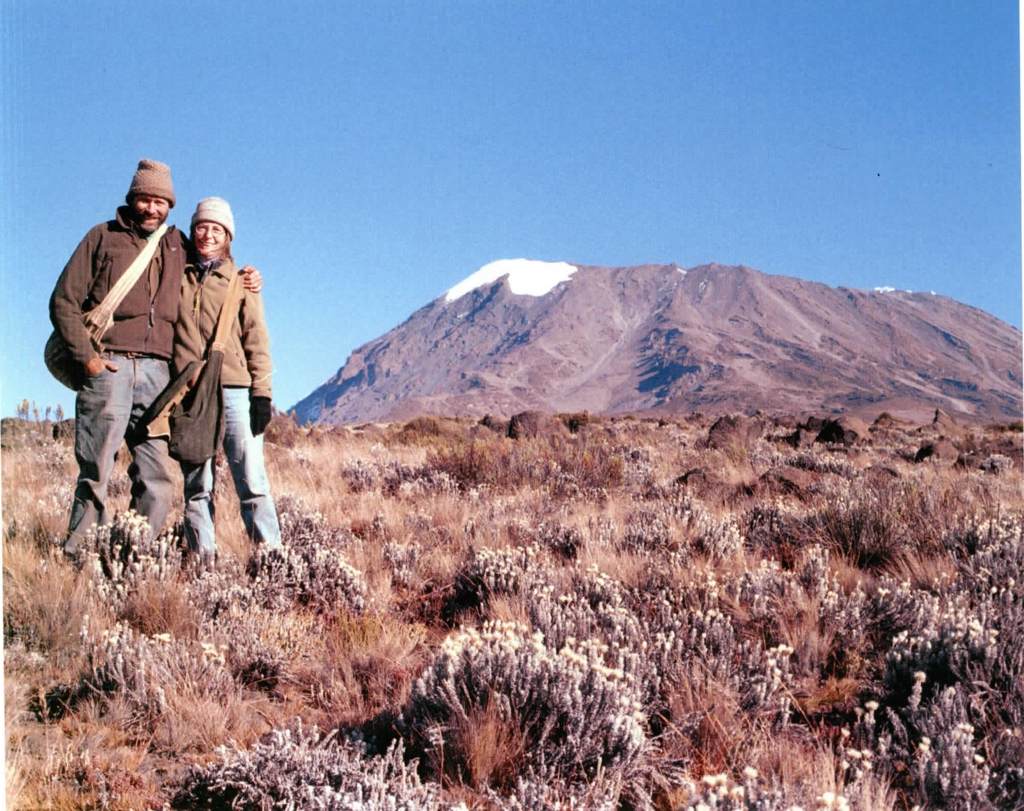 Bill and his best gal, Mary Anne Rogers, during fieldwork on Mt. Kilimanjaro in 2002 (Kibo, one of Kilimanjaro’s peaks, in the background). Courtesy of Mary Anne Rogers.