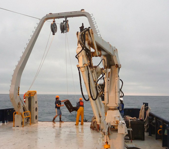 Getting ready to release an otter trawl for collecting deep-sea fishes off the coast of San Diego.