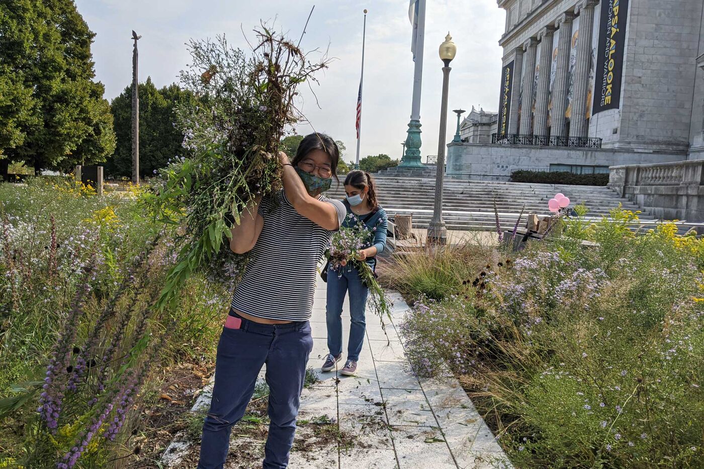 Staff from the Keller Science Action Center do garden maintenance at a 2020 work day.