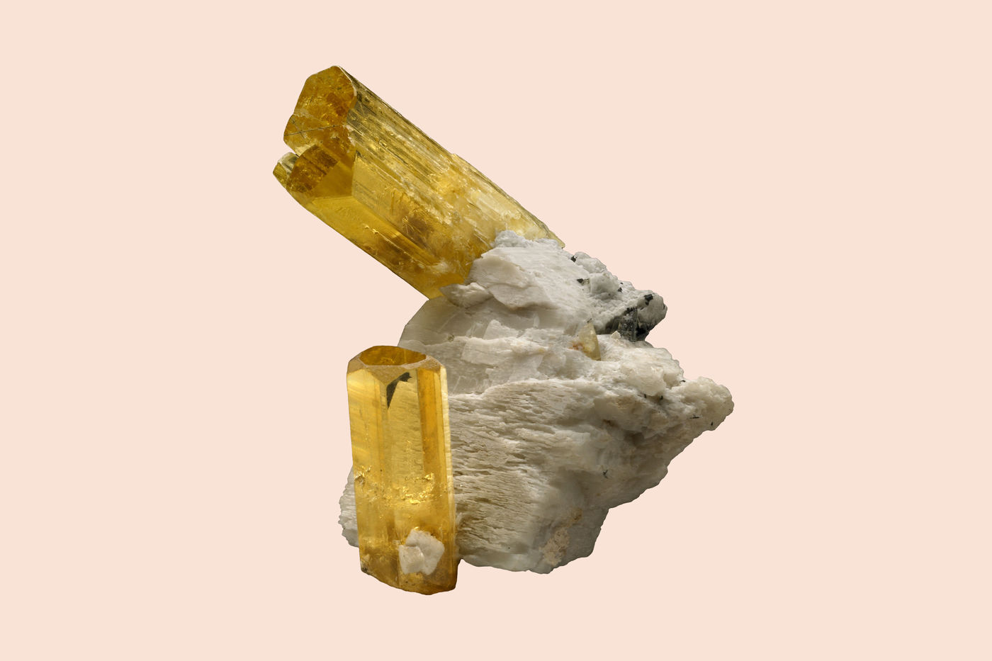 Natural crystals of heliodor from the Zelatoya Vata mine in Tajikistan. The largest crystal is 68 mm long.
