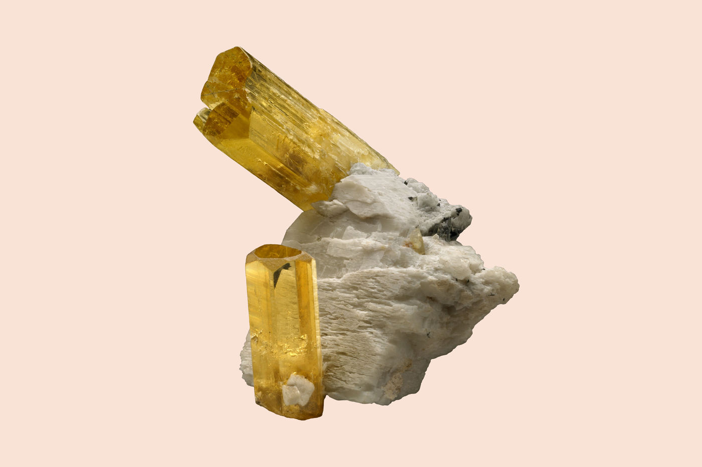Caption Override 1            Natural crystals of heliodor from the Zelatoya Vata mine in Tajikistan. The largest crystal is 68 mm long.