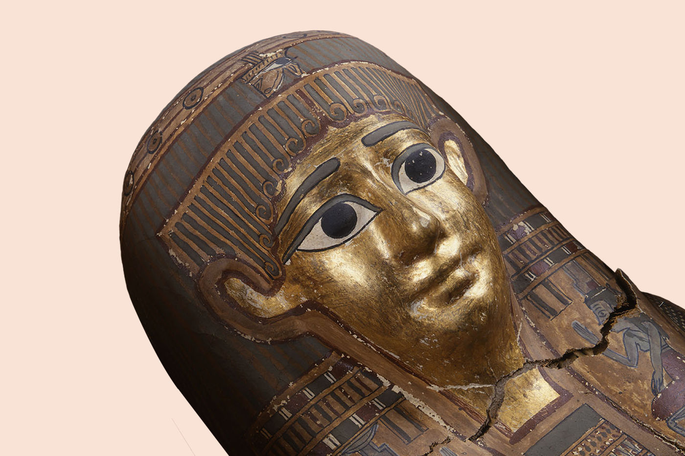 The Egyptian mummification process took 70 days. This ancient Egyptian mummy was preserved in a plain cedar box, but its coffin has a painted face mask with gold details.