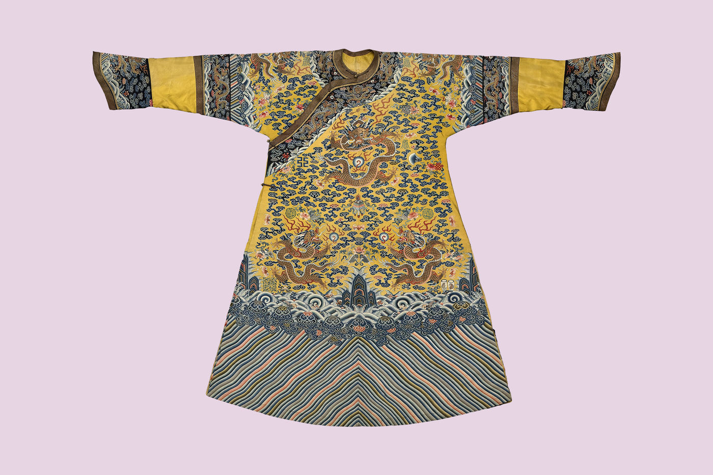 This Qing (ching) Dynasty silk robe features the two-horned, five-clawed dragon, traditionally used only by the emperor to acknowledge his special status as a link between human and supernatural worlds.