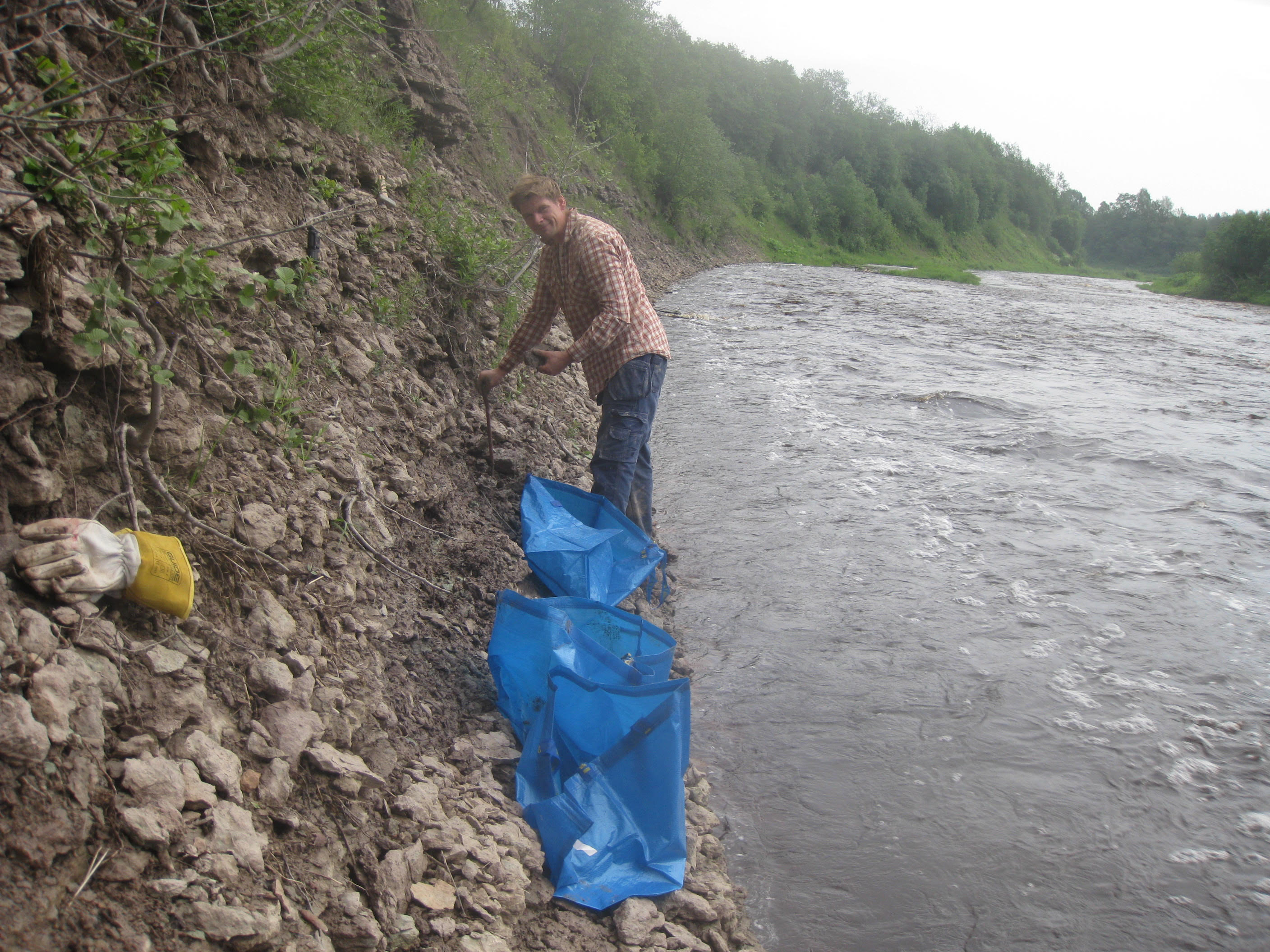 One of Heck's co-authors collecting rocks containing ancient micrometeorites from the bed of the Lynna River in Russia. Photo by Birger Schmitz, Lund University.