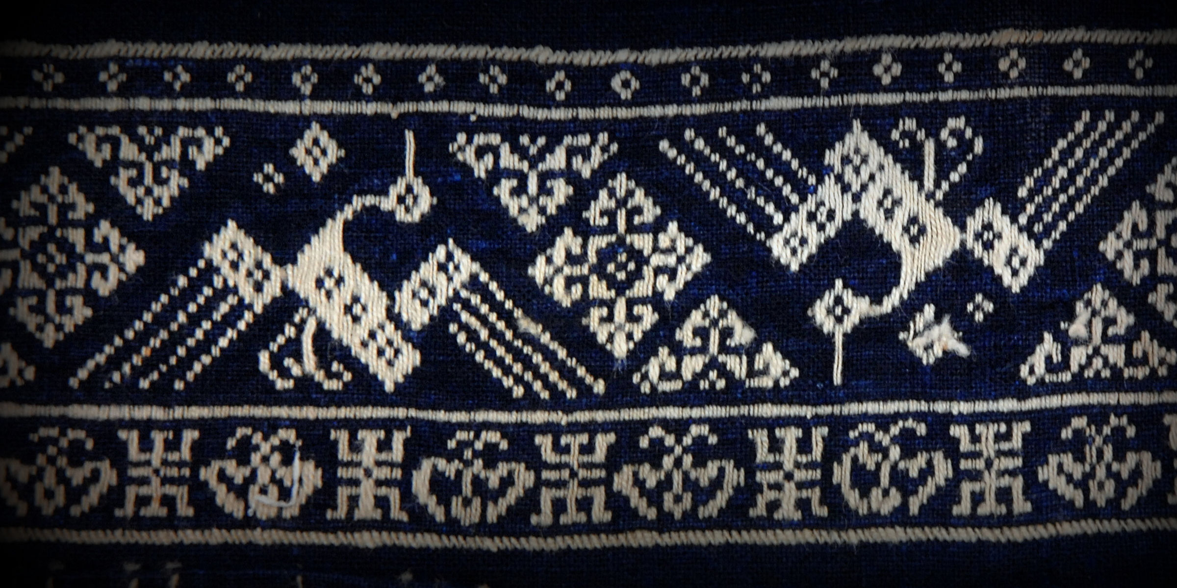 Detail of an embroidered cotton sleeve band, Mianyang, Sichuan, China. Collected by Carl Schuster. Catalog Number 2724.234232. © The Field Museum.