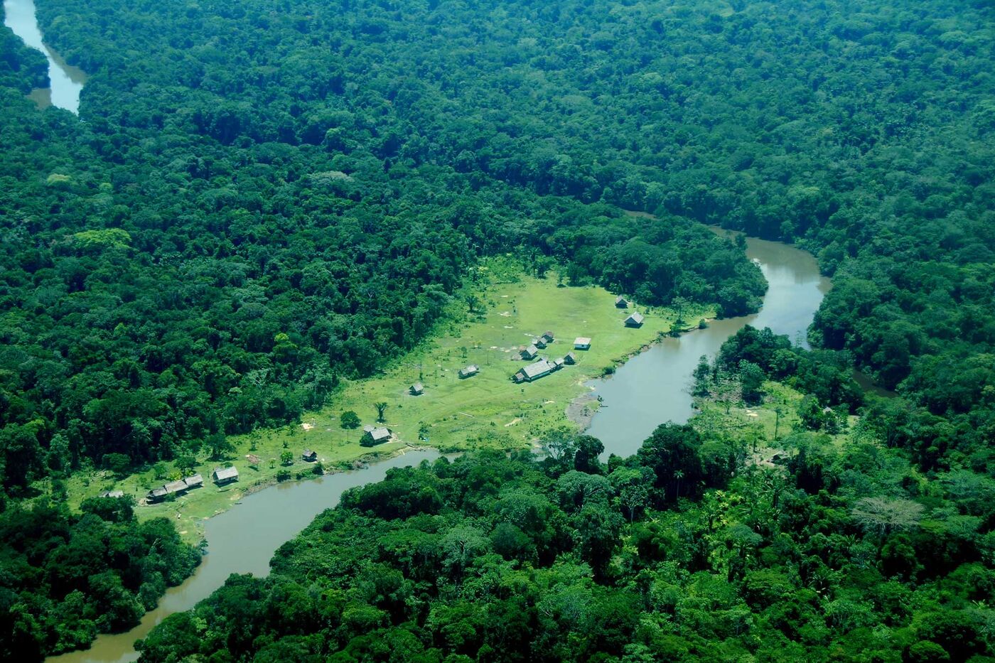 An aerial view of a community along the river in Loreto, Peru.