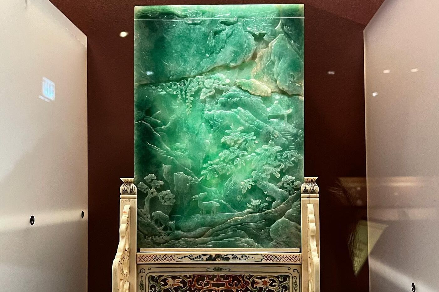 An intricate jade and gold desk screen from the Qing period.