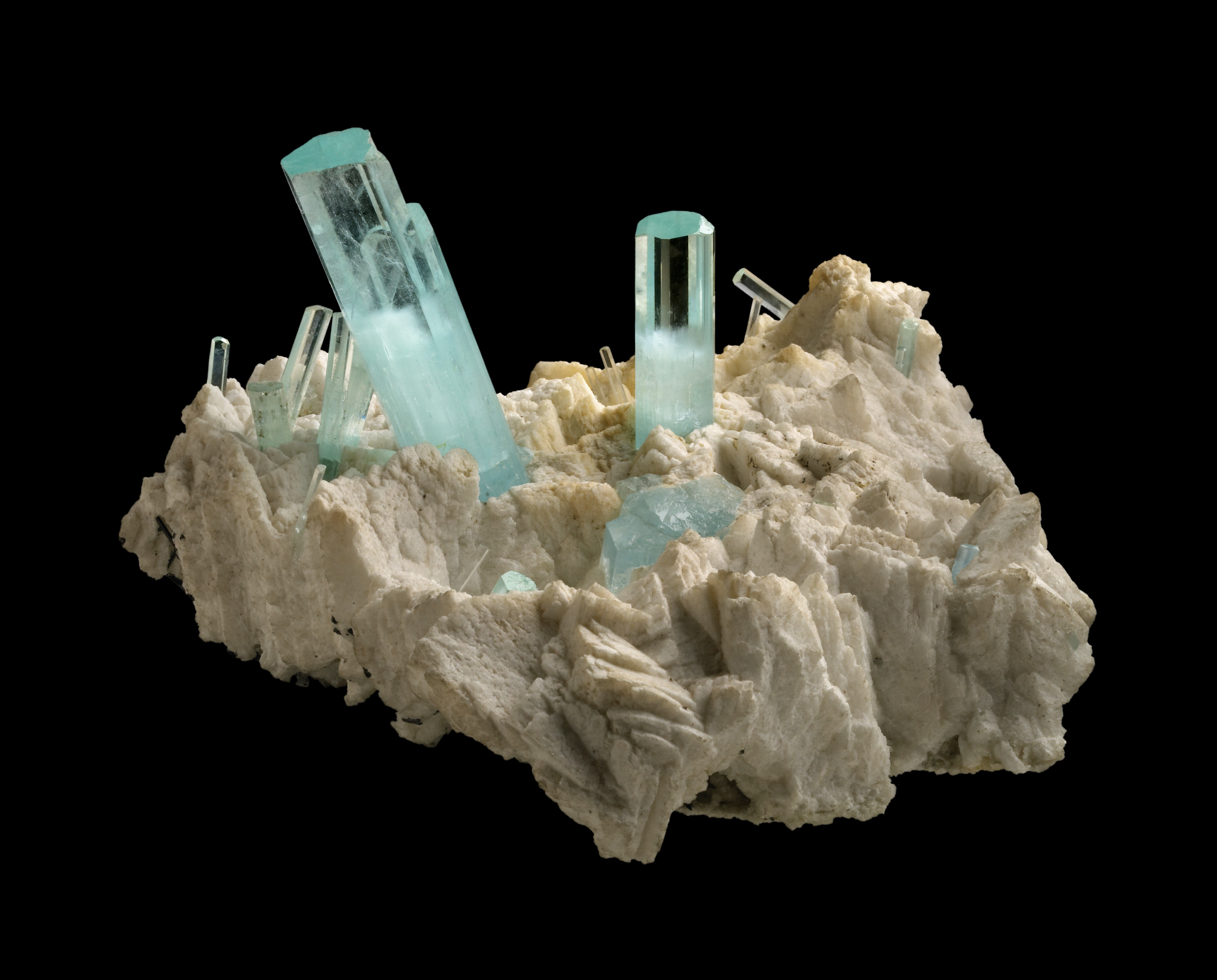 Natural aquamarine crystals in white Albite Feldspar matrix. Length of largest crystal is 70 mm 