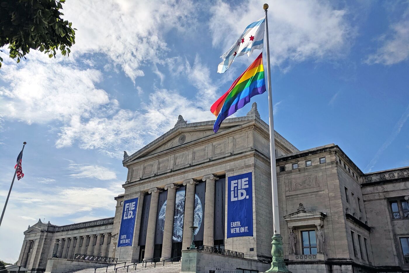 museum exterior, showing Chicago and Pride flags