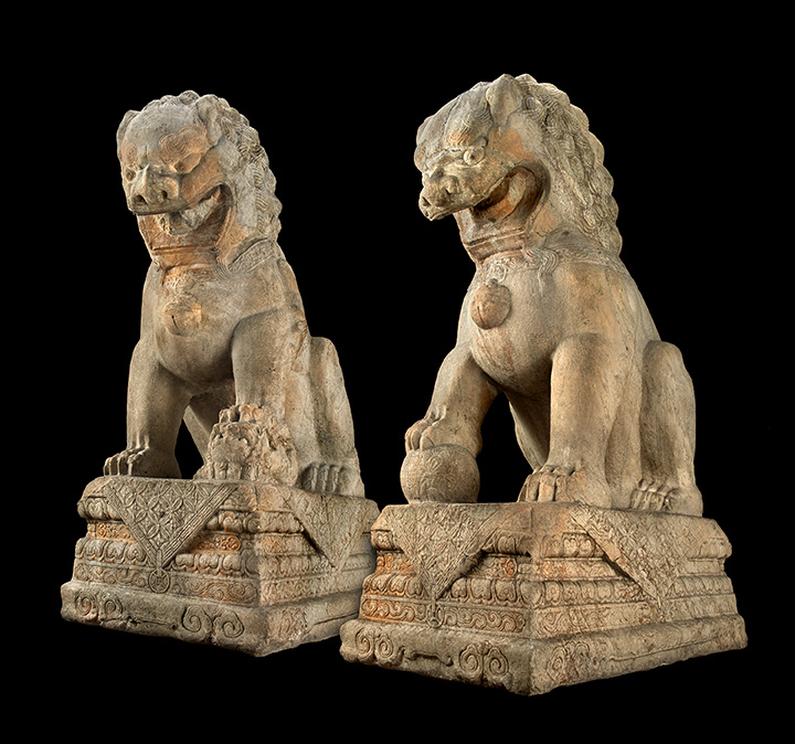 Two carved stone lions