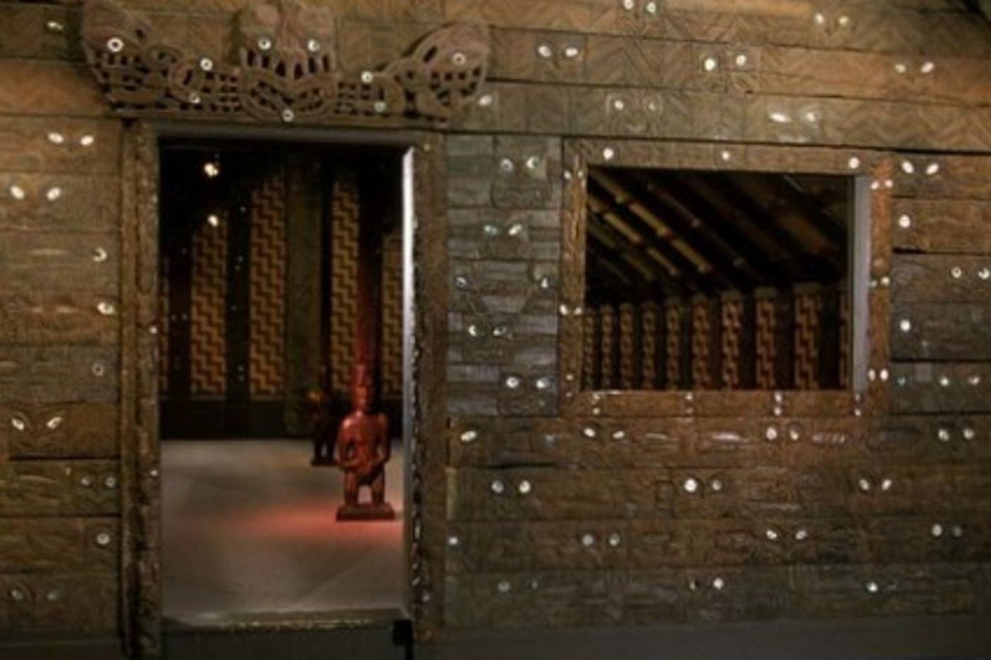 Detail of front of Ruatepupuke II – wharenui – Maori meeting house from Tokomaru Bay, New Zealand. Catalog Number 967.143961.