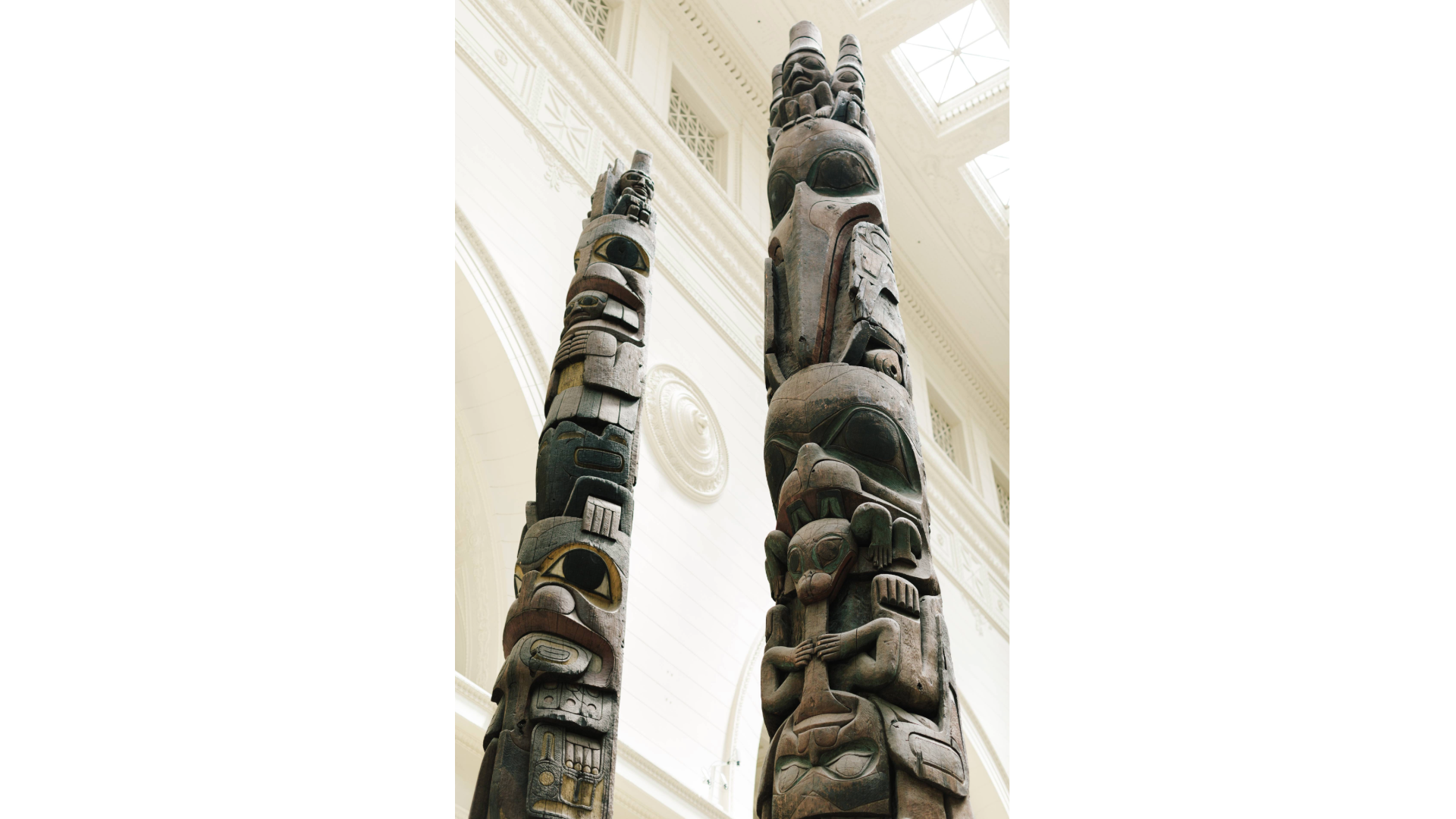 Two large carved totem poles