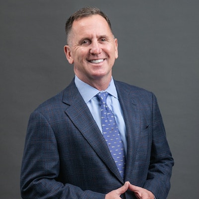 Formal headshot of Kenneth W. O'Keefe