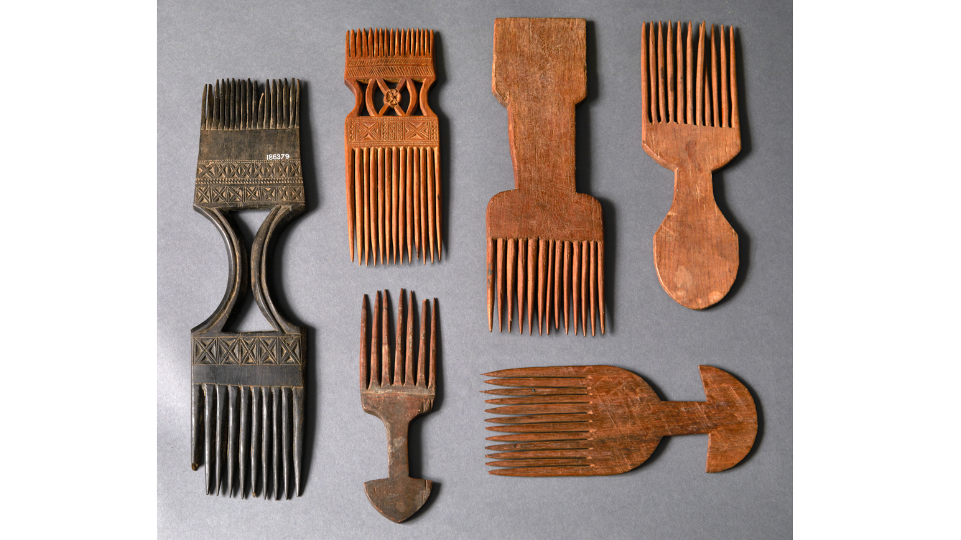 A collection of carved Africa hair picks